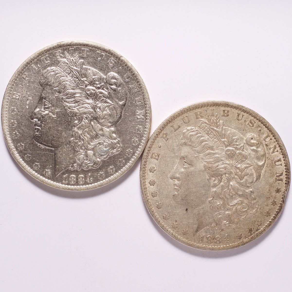 1884-O Morgan Silver Dollar 2-Coin Lot - Numismax